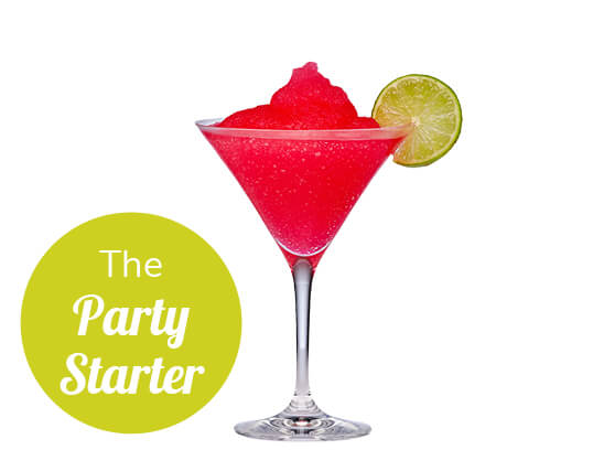 red cosmo cocktail with a slice of lime on the rim of the glass